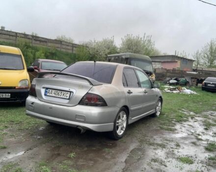 Сірий Міцубісі Lancer, об'ємом двигуна 2 л та пробігом 140 тис. км за 1400 $, фото 3 на Automoto.ua