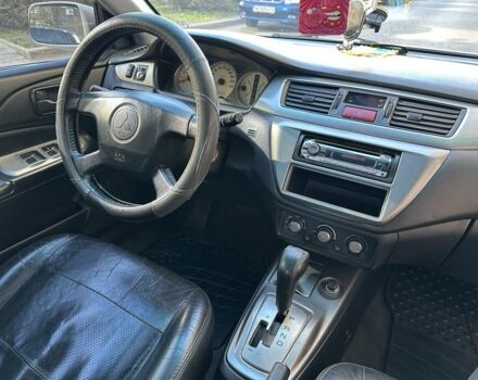 Мицубиси Лансер 2006 в Одессе на Automoto.ua Серый Мицубиси Лансер, объемом двигателя 1.6 л и пробегом 240 тыс. км за 4900 $, фото 7 на Automoto.ua