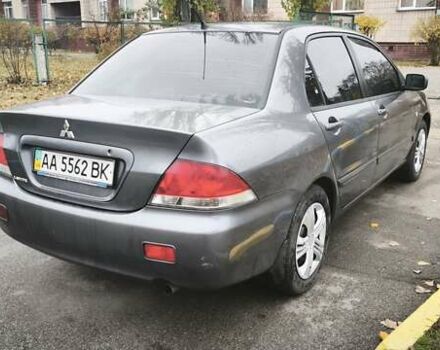 Серый Мицубиси Лансер, объемом двигателя 1.6 л и пробегом 263 тыс. км за 3800 $, фото 8 на Automoto.ua