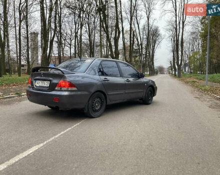 Сірий Міцубісі Lancer, об'ємом двигуна 1.6 л та пробігом 222 тис. км за 4900 $, фото 2 на Automoto.ua