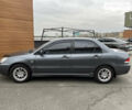 Сірий Міцубісі Lancer, об'ємом двигуна 1.6 л та пробігом 260 тис. км за 4998 $, фото 1 на Automoto.ua