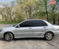 Серый Мицубиси Лансер, объемом двигателя 1.6 л и пробегом 195 тыс. км за 4800 $, фото 4 на Automoto.ua