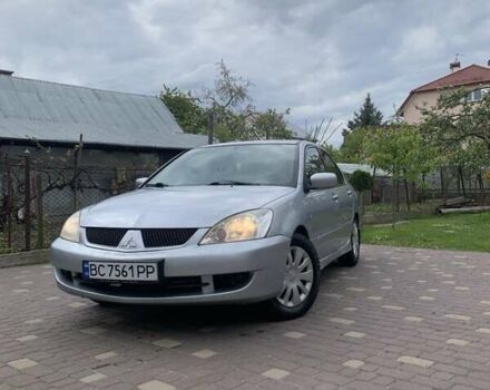 Сірий Міцубісі Lancer, об'ємом двигуна 1.58 л та пробігом 300 тис. км за 3600 $, фото 19 на Automoto.ua