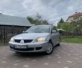 Сірий Міцубісі Lancer, об'ємом двигуна 1.58 л та пробігом 300 тис. км за 3600 $, фото 19 на Automoto.ua