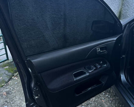 Сірий Міцубісі Lancer, об'ємом двигуна 2 л та пробігом 200 тис. км за 4999 $, фото 14 на Automoto.ua