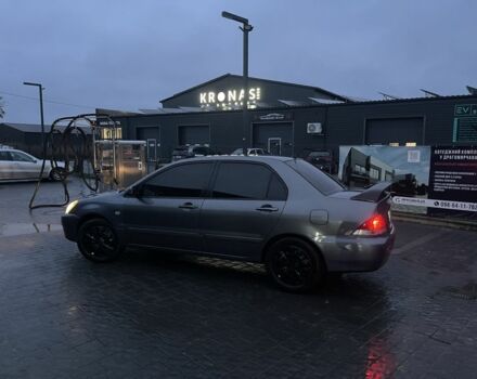 Серый Мицубиси Лансер, объемом двигателя 1.6 л и пробегом 213 тыс. км за 4450 $, фото 3 на Automoto.ua