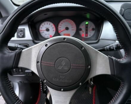 Серый Мицубиси Лансер, объемом двигателя 2 л и пробегом 256 тыс. км за 7000 $, фото 2 на Automoto.ua