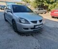 Сірий Міцубісі Lancer, об'ємом двигуна 2 л та пробігом 270 тис. км за 3767 $, фото 1 на Automoto.ua