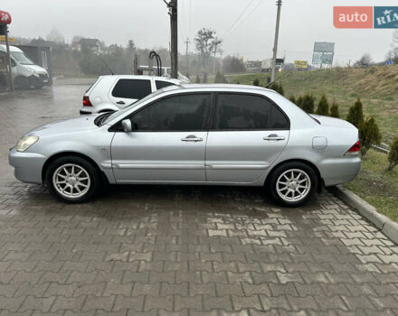 Сірий Міцубісі Lancer, об'ємом двигуна 1.6 л та пробігом 223 тис. км за 3900 $, фото 2 на Automoto.ua