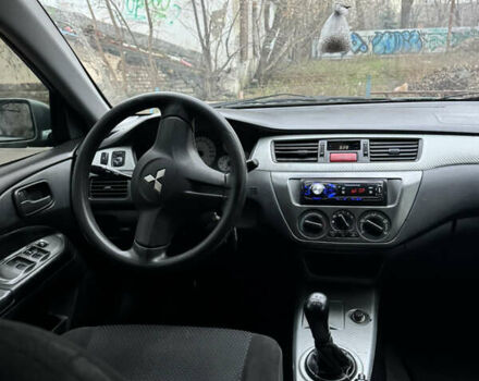 Сірий Міцубісі Lancer, об'ємом двигуна 1.6 л та пробігом 240 тис. км за 3000 $, фото 13 на Automoto.ua