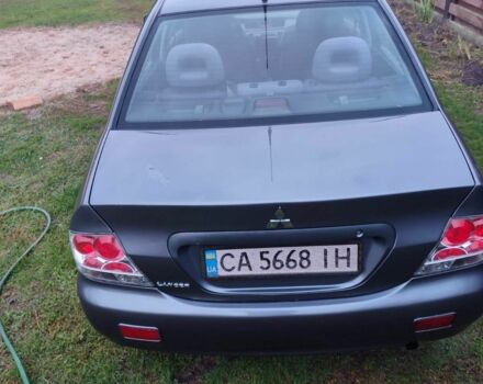 Сірий Міцубісі Lancer, об'ємом двигуна 1.6 л та пробігом 190 тис. км за 3500 $, фото 1 на Automoto.ua