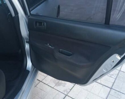 Мицубиси Лансер 2006 в Каменское - Днепродзержинск на Automoto.ua Серый Мицубиси Лансер, объемом двигателя 1.58 л и пробегом 238 тыс. км за 5400 $, фото 10 на Automoto.ua