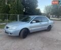 Сірий Міцубісі Lancer, об'ємом двигуна 1.58 л та пробігом 412 тис. км за 2500 $, фото 1 на Automoto.ua
