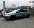 Серый Мицубиси Лансер, объемом двигателя 1.58 л и пробегом 290 тыс. км за 4500 $, фото 1 на Automoto.ua