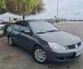 Серый Мицубиси Лансер, объемом двигателя 0 л и пробегом 229 тыс. км за 4800 $, фото 1 на Automoto.ua