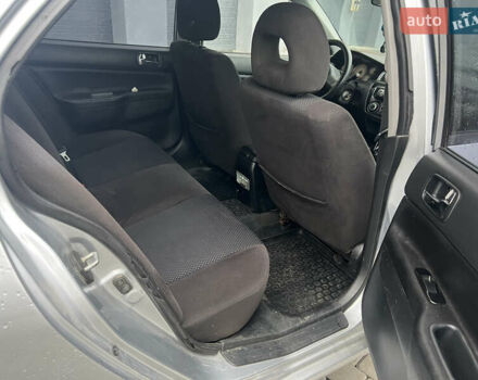 Серый Мицубиси Лансер, объемом двигателя 1.58 л и пробегом 333 тыс. км за 2600 $, фото 13 на Automoto.ua