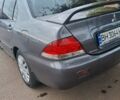 Сірий Міцубісі Lancer, об'ємом двигуна 1.6 л та пробігом 229 тис. км за 4900 $, фото 3 на Automoto.ua