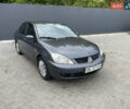 Сірий Міцубісі Lancer, об'ємом двигуна 1.58 л та пробігом 162 тис. км за 4650 $, фото 2 на Automoto.ua