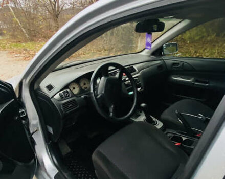 Серый Мицубиси Лансер, объемом двигателя 1.6 л и пробегом 253 тыс. км за 2850 $, фото 14 на Automoto.ua