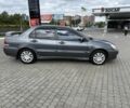Серый Мицубиси Лансер, объемом двигателя 1.6 л и пробегом 240 тыс. км за 2550 $, фото 1 на Automoto.ua