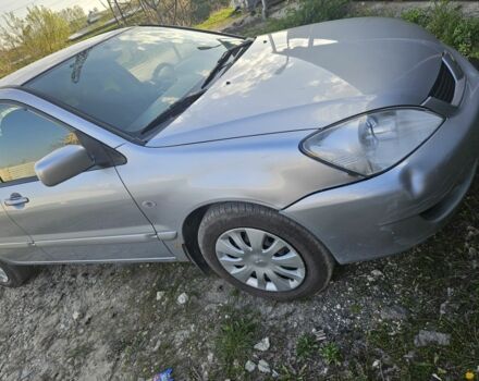 Сірий Міцубісі Lancer, об'ємом двигуна 0.16 л та пробігом 199 тис. км за 3800 $, фото 6 на Automoto.ua