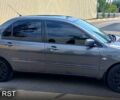 Сірий Міцубісі Lancer, об'ємом двигуна 1.6 л та пробігом 125 тис. км за 3850 $, фото 2 на Automoto.ua