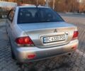 Серый Мицубиси Лансер, объемом двигателя 1.58 л и пробегом 301 тыс. км за 3500 $, фото 11 на Automoto.ua