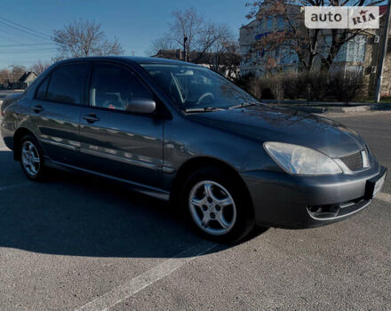 Сірий Міцубісі Lancer, об'ємом двигуна 1.6 л та пробігом 305 тис. км за 5200 $, фото 2 на Automoto.ua