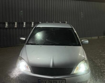 Серый Мицубиси Лансер, объемом двигателя 1.6 л и пробегом 330 тыс. км за 3200 $, фото 1 на Automoto.ua