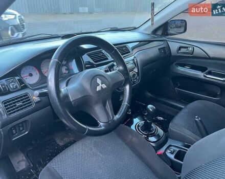 Серый Мицубиси Лансер, объемом двигателя 1.6 л и пробегом 279 тыс. км за 3990 $, фото 8 на Automoto.ua