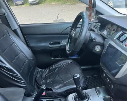 Сірий Міцубісі Lancer, об'ємом двигуна 1.58 л та пробігом 197 тис. км за 3450 $, фото 1 на Automoto.ua
