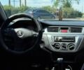 Серый Мицубиси Лансер, объемом двигателя 2 л и пробегом 260 тыс. км за 4500 $, фото 22 на Automoto.ua