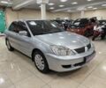 Сірий Міцубісі Lancer, об'ємом двигуна 1.6 л та пробігом 173 тис. км за 4298 $, фото 1 на Automoto.ua