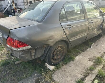 Сірий Міцубісі Lancer, об'ємом двигуна 1.6 л та пробігом 200 тис. км за 1150 $, фото 3 на Automoto.ua