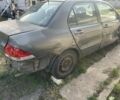 Сірий Міцубісі Lancer, об'ємом двигуна 1.6 л та пробігом 200 тис. км за 1150 $, фото 3 на Automoto.ua