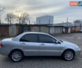 Серый Мицубиси Лансер, объемом двигателя 1.6 л и пробегом 261 тыс. км за 5100 $, фото 7 на Automoto.ua