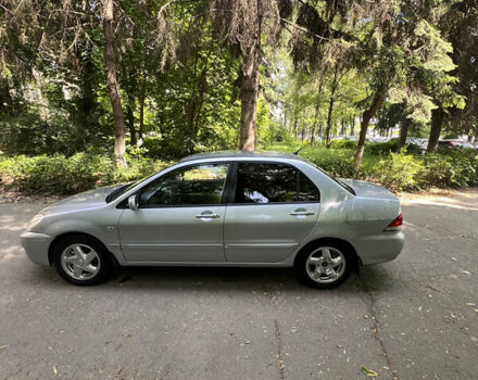 Сірий Міцубісі Lancer, об'ємом двигуна 1.6 л та пробігом 333 тис. км за 2600 $, фото 5 на Automoto.ua