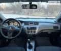 Сірий Міцубісі Lancer, об'ємом двигуна 1.58 л та пробігом 211 тис. км за 4900 $, фото 32 на Automoto.ua