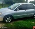 Сірий Міцубісі Lancer, об'ємом двигуна 1.6 л та пробігом 280 тис. км за 3200 $, фото 1 на Automoto.ua