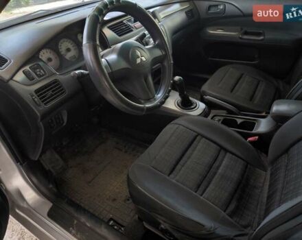 Сірий Міцубісі Lancer, об'ємом двигуна 1.58 л та пробігом 186 тис. км за 4300 $, фото 2 на Automoto.ua