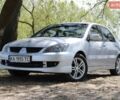 Серый Мицубиси Лансер, объемом двигателя 2 л и пробегом 141 тыс. км за 6000 $, фото 1 на Automoto.ua