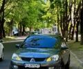 Серый Мицубиси Лансер, объемом двигателя 1.6 л и пробегом 283 тыс. км за 5000 $, фото 1 на Automoto.ua