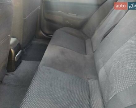 Серый Мицубиси Лансер, объемом двигателя 1.58 л и пробегом 250 тыс. км за 4700 $, фото 9 на Automoto.ua