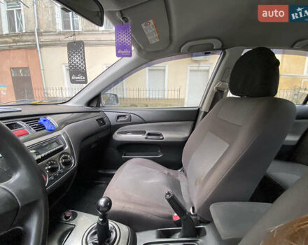 Серый Мицубиси Лансер, объемом двигателя 1.6 л и пробегом 444 тыс. км за 3400 $, фото 13 на Automoto.ua