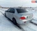 Сірий Міцубісі Lancer, об'ємом двигуна 1.58 л та пробігом 297 тис. км за 3555 $, фото 5 на Automoto.ua