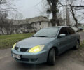 Сірий Міцубісі Lancer, об'ємом двигуна 1.6 л та пробігом 240 тис. км за 3000 $, фото 2 на Automoto.ua