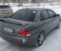 Серый Мицубиси Лансер, объемом двигателя 1.6 л и пробегом 290 тыс. км за 2450 $, фото 6 на Automoto.ua