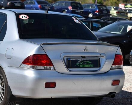 Серый Мицубиси Лансер, объемом двигателя 1.6 л и пробегом 230 тыс. км за 4550 $, фото 4 на Automoto.ua