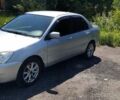 Сірий Міцубісі Lancer, об'ємом двигуна 1.59 л та пробігом 194 тис. км за 4600 $, фото 1 на Automoto.ua