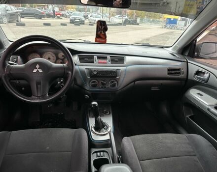 Серый Мицубиси Лансер, объемом двигателя 1.6 л и пробегом 250 тыс. км за 2550 $, фото 7 на Automoto.ua